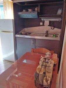 Kuchyň nebo kuchyňský kout v ubytování Kimi apartments