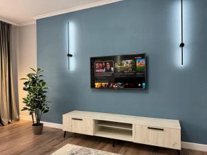 TV a/nebo společenská místnost v ubytování West Side