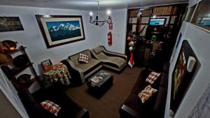 an overhead view of a living room with couches at Mirador Backpackers B&B in Huaraz