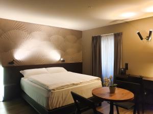 Voodi või voodid majutusasutuse San Carlo Suite toas