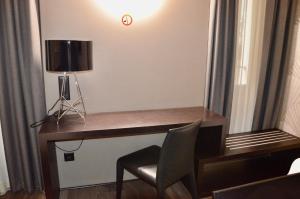 Televiisor ja/või meelelahutuskeskus majutusasutuses San Carlo Suite