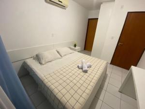 Postel nebo postele na pokoji v ubytování Pousada Mar de Maceió
