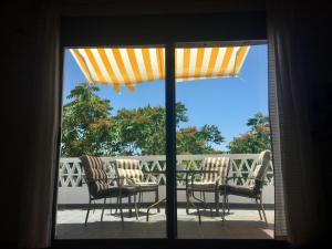 Un balcón o terraza en Valle de la Calma - Apartamentos rurales de Mecina 10 fotos más