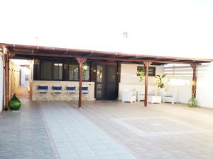 Patio nebo venkovní prostory v ubytování Villa Hermosa Beach