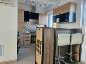 Kuchyňa alebo kuchynka v ubytovaní Apartman Dominic