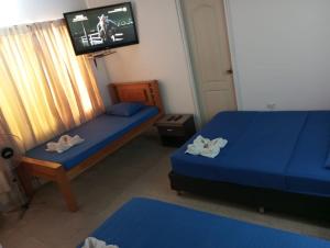 Postel nebo postele na pokoji v ubytování Yellow House Hostel