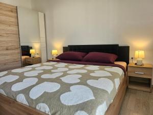 Postel nebo postele na pokoji v ubytování Apartman Dominic