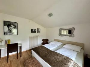 Postelja oz. postelje v sobi nastanitve Boutique Hotel Oase