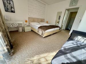 Postelja oz. postelje v sobi nastanitve Boutique Hotel Oase