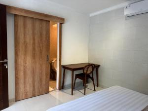 Postel nebo postele na pokoji v ubytování Made Arsa Homestay
