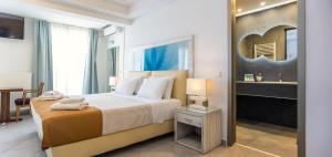Postel nebo postele na pokoji v ubytování Hotel Lido Thassos