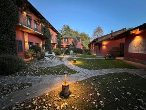 Vonkajšia záhrada v ubytovaní Le Serre Suites & Apartments