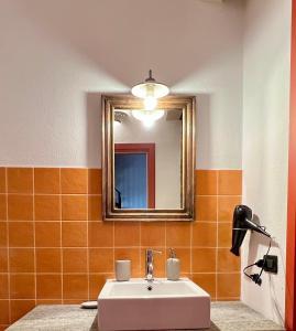 Kúpeľňa v ubytovaní Le Serre Suites & Apartments
