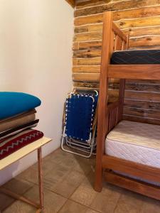 Postel nebo postele na pokoji v ubytování Cabaña Manzano Historico Punta Negra Lodge 2