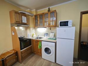 Η κουζίνα ή μικρή κουζίνα στο Apartment in the Center 2