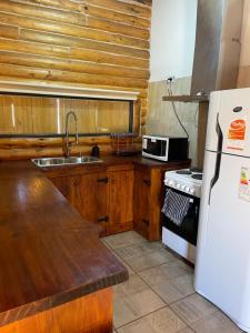 トゥヌヤンにあるCabaña Manzano Historico Punta Negra Lodge 2のギャラリーの写真