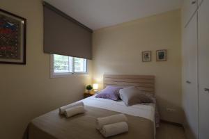 Postel nebo postele na pokoji v ubytování Salouhouses Apartment Cala Crancs