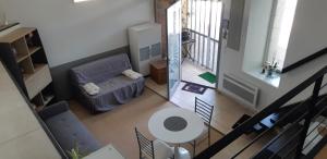 Posteľ alebo postele v izbe v ubytovaní Petit loft face rivière