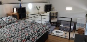 Posteľ alebo postele v izbe v ubytovaní Petit loft face rivière
