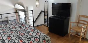 Posteľ alebo postele v izbe v ubytovaní Petit loft face rivière