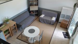 Posteľ alebo postele v izbe v ubytovaní Petit loft face rivière