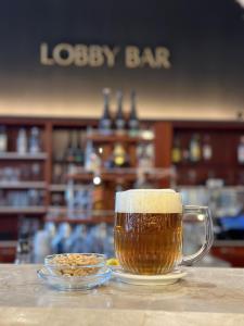 Lounge nebo bar v ubytování Spa & Wellness Hotel Olympia Marienbad