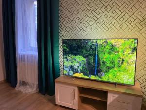 TV a/nebo společenská místnost v ubytování Golden Home - Gliwice Centrum, Mikolowska - z zadaszonym parkingem w cenie