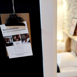 Postel nebo postele na pokoji v ubytování B&B En face du Marronnier