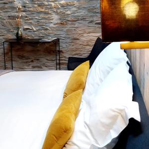 Postel nebo postele na pokoji v ubytování B&B En face du Marronnier