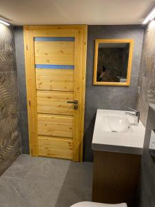 Koupelna v ubytování Chalet Galla