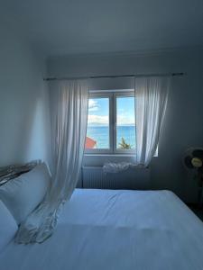Krevet ili kreveti u jedinici u okviru objekta Daniels Homestay