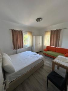 Rúm í herbergi á Daniels Homestay +14 myndir