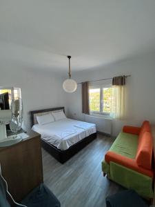 Rúm í herbergi á Daniels Homestay