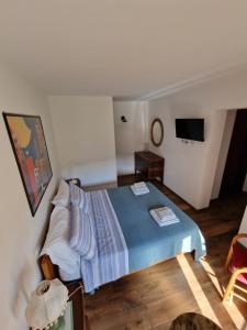 Postel nebo postele na pokoji v ubytování Casa Marianna