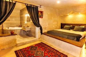 Postel nebo postele na pokoji v ubytování Solin Cave Cappadocia