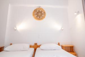 Postel nebo postele na pokoji v ubytování Melissa Rooms Naxos