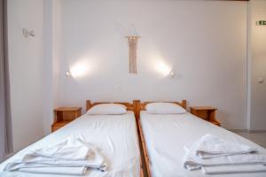Postel nebo postele na pokoji v ubytování Melissa Rooms Naxos