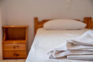 Postel nebo postele na pokoji v ubytování Melissa Rooms Naxos