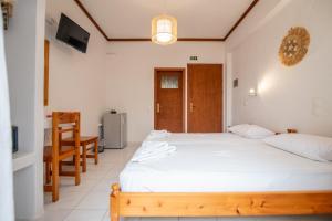 Postel nebo postele na pokoji v ubytování Melissa Rooms Naxos