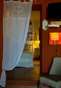 Postel nebo postele na pokoji v ubytování B&B Sole e Luna