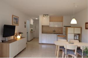 Kuchyň nebo kuchyňský kout v ubytování Salouhouses Apartment Cala Crancs
