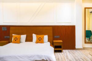 Ein Bett oder Betten in einem Zimmer der Unterkunft Hide-In Hostel Delhi