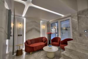 Posezení v ubytování EMPIRE PLATINUM SUITES,New Delhi