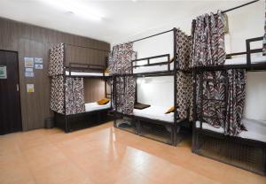 Ein Bett oder Betten in einem Zimmer der Unterkunft Hide-In Hostel Delhi
