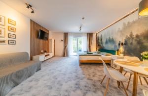 Postel nebo postele na pokoji v ubytování Luxusní apartmány Domovjanka - VELKÁ STOLOVÁ a MALÁ STOLOVÁ
