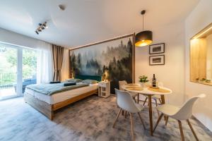 Postel nebo postele na pokoji v ubytování Luxusní apartmány Domovjanka - VELKÁ STOLOVÁ a MALÁ STOLOVÁ