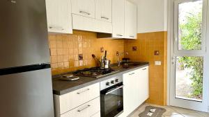 Η κουζίνα ή μικρή κουζίνα στο N084 - Numana, villa quadrilocale con meraviglioso giardino