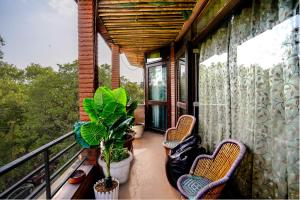 Ein Balkon oder eine Terrasse in der Unterkunft Hide-In Hostel Delhi