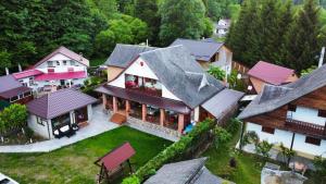 an aerial view of a house with roofs at Casa Marco in Lepşa