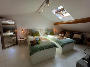 Ένα ή περισσότερα κρεβάτια σε δωμάτιο στο les Métras